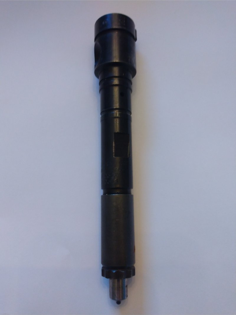 Rebuilt HNM780322R Mack Injector with 771833 Tip